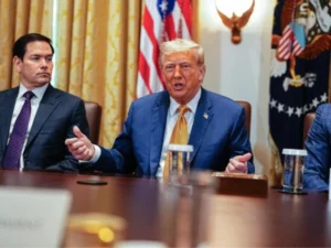 Trump warns Iran of unprecedented force if it retaliates