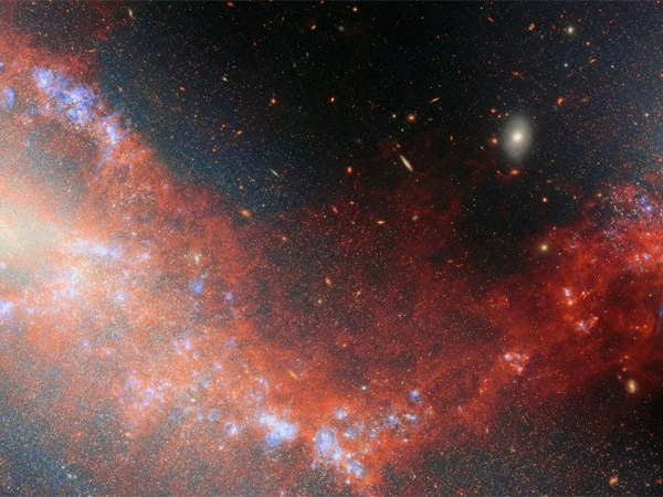 Two dwarf galaxies dancing 24 million light-years away